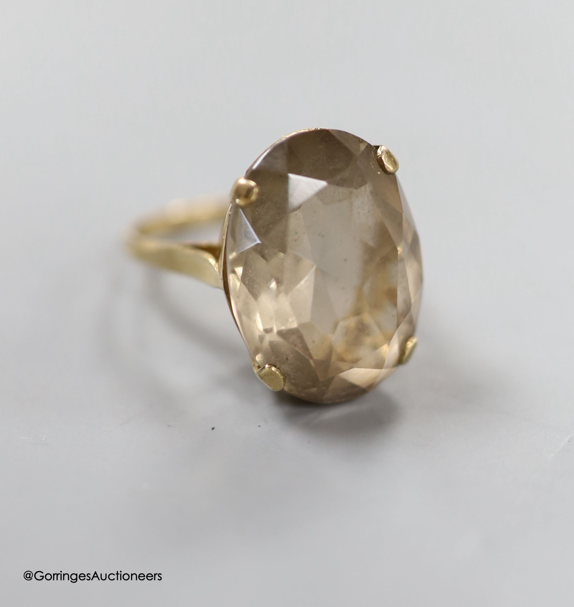 Two modern 9ct gold and smoky quartz set dress rings, gross weight 18.3 grams and a white metal and paste set necklace.